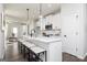 Spacious kitchen with an island, breakfast bar seating, and stainless steel appliances at 337 Skylar Se Way, Atlanta, GA 30315