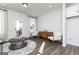 Modern living space featuring a decorative rug, stylish furniture, and lots of natural light at 337 Skylar Se Way, Atlanta, GA 30315