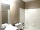 Bathroom with a tub, white tile surround and a modern vanity with a single sink at 1273 Baywood Gln, Lithonia, GA 30058