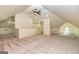 Finished attic space featuring carpet, recessed lighting, dormers, and neutral paint at 721 Wedowee St, Bowdon, GA 30108
