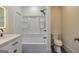 Modern bathroom with vanity, shower and stylish black and white tile at 721 Wedowee St, Bowdon, GA 30108