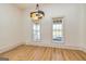Bright open living room with hardwood flooring and large windows at 721 Wedowee St, Bowdon, GA 30108