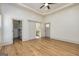 Spacious main bedroom featuring hardwood floors, an exterior door, and a walk-in closet at 721 Wedowee St, Bowdon, GA 30108