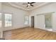 Spacious main bedroom with hardwood floors and ensuite bathroom at 721 Wedowee St, Bowdon, GA 30108