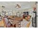 Spacious living room with hardwood floors, fireplace, and comfortable leather furniture at 300 The Enclave, Peachtree City, GA 30269
