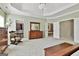 Spacious main bedroom with tray ceiling and closets at 300 The Enclave, Peachtree City, GA 30269