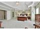 Spacious main bedroom with a tray ceiling and access to other rooms at 300 The Enclave, Peachtree City, GA 30269