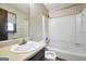 Bathroom featuring a tub, toilet and a sink with framed mirror above at 40 Derby Country Dr, Ellenwood, GA 30294