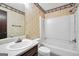 Bathroom featuring a tub, toilet and a sink with framed mirror above at 40 Derby Country Dr, Ellenwood, GA 30294