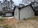 Well-maintained home exterior featuring vinyl siding and landscaping around the foundation at 127 Brookwood Estates Trl, Stockbridge, GA 30281