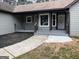 Welcoming covered front porch and manicured landscaping enhance the home's curb appeal at 127 Brookwood Estates Trl, Stockbridge, GA 30281