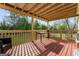 Enjoy outdoor living on this wood deck with a view of the backyard at 152 Summerfield Dr, Mcdonough, GA 30253