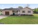 Charming single-story home with a well-maintained lawn, neat landscaping, and inviting entrance at 152 Summerfield Dr, Mcdonough, GA 30253