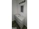 Bright bathroom with white vanity and quartz countertop at 5796 Par Four Ct, Lithonia, GA 30038