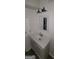 Modern bathroom with gray vanity cabinet and chrome fixtures at 5796 Par Four Ct, Lithonia, GA 30038