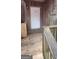Entrance to a home featuring address number, and a weathered wood porch at 5796 Par Four Ct, Lithonia, GA 30038