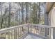 Deck and backyard space featuring a large yard with an abundance of trees at 6192 Holiday Blvd, Forest Park, GA 30297