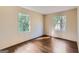 Bedroom with hardwood floors featuring 2 windows that offer great outdoor light and views at 6192 Holiday Blvd, Forest Park, GA 30297