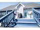 View of the back deck with stairs, a barbecue, plants and access to the house at 106 Victoria Way, Carrollton, GA 30116