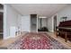 Spacious finished basement with room for entertaining, featuring a piano and exercise equipment at 106 Victoria Way, Carrollton, GA 30116