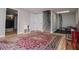 Finished basement with hardwood floors, neutral paint, stairs, storage closet, and workout space at 106 Victoria Way, Carrollton, GA 30116