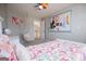 Comfortable bedroom with a vibrant butterfly theme and a hanging chair at 106 Victoria Way, Carrollton, GA 30116