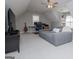 Spacious carpeted bonus room with seating, desk and window at 106 Victoria Way, Carrollton, GA 30116
