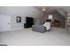 View of bonus room area with seating, television and desk at 106 Victoria Way, Carrollton, GA 30116