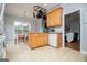 Bright kitchen featuring wood cabinets, granite countertops, and stainless steel appliances at 106 Victoria Way, Carrollton, GA 30116