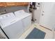 A laundry room offers a side-by-side washer and dryer at 106 Victoria Way, Carrollton, GA 30116