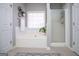 The main bathroom includes both a soaking tub and a shower at 106 Victoria Way, Carrollton, GA 30116
