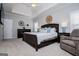 Comfortable main bedroom featuring neutral paint and carpeted flooring at 106 Victoria Way, Carrollton, GA 30116