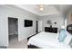 A comfortably appointed main bedroom features neutral paint and carpeted flooring at 106 Victoria Way, Carrollton, GA 30116