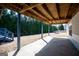 Covered patio space, great for outdoor seating and entertainment at 106 Victoria Way, Carrollton, GA 30116