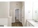 Bathroom featuring modern vanity, granite countertop, and decorative tile backsplash at 139 Surge Stone Ln, Stockbridge, GA 30281