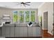 Bright living room boasts a fireplace, large windows, and an open floor plan at 679 Bo Bo Banks Rd, Grantville, GA 30220