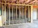 Unfinished basement features exposed frame and a concrete foundation at 413 Samara Ct, Fairburn, GA 30213