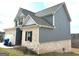 Charming two-story home featuring gray siding and brick accents at 413 Samara Ct, Fairburn, GA 30213