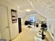 Nicely lit attic room with exercise bike at 170 White Rd, Fayetteville, GA 30214