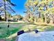 Spacious backyard with mature trees and room to entertain at 170 White Rd, Fayetteville, GA 30214