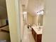 Cozy bathroom featuring a single sink vanity and tiled floor at 170 White Rd, Fayetteville, GA 30214