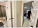Hallway showcasing doors leading to the bathroom and bedroom at 170 White Rd, Fayetteville, GA 30214