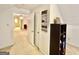 Hallway featuring a view into another room and a view of storage at 170 White Rd, Fayetteville, GA 30214