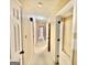 Hallway featuring neutral walls, carpet flooring, and multiple doorways at 170 White Rd, Fayetteville, GA 30214