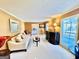 Spacious living room featuring neutral walls, plush carpeting, and ample natural light, creating a welcoming atmosphere at 170 White Rd, Fayetteville, GA 30214