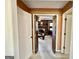 Spacious living room with a fireplace and double doors leading to the hallway at 170 White Rd, Fayetteville, GA 30214