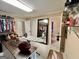 Spacious walk-in closet with an ironing board and a mirror at 170 White Rd, Fayetteville, GA 30214