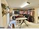 Large walk-in closet with ample storage and built-in shelving at 170 White Rd, Fayetteville, GA 30214