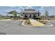 Community clubhouse with well-manicured landscaping, easy parking, and accessible ramps at 305 Roundwood Way, Peachtree City, GA 30269