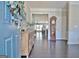 Welcoming foyer with hardwood floors and elegant decor at 305 Roundwood Way, Peachtree City, GA 30269